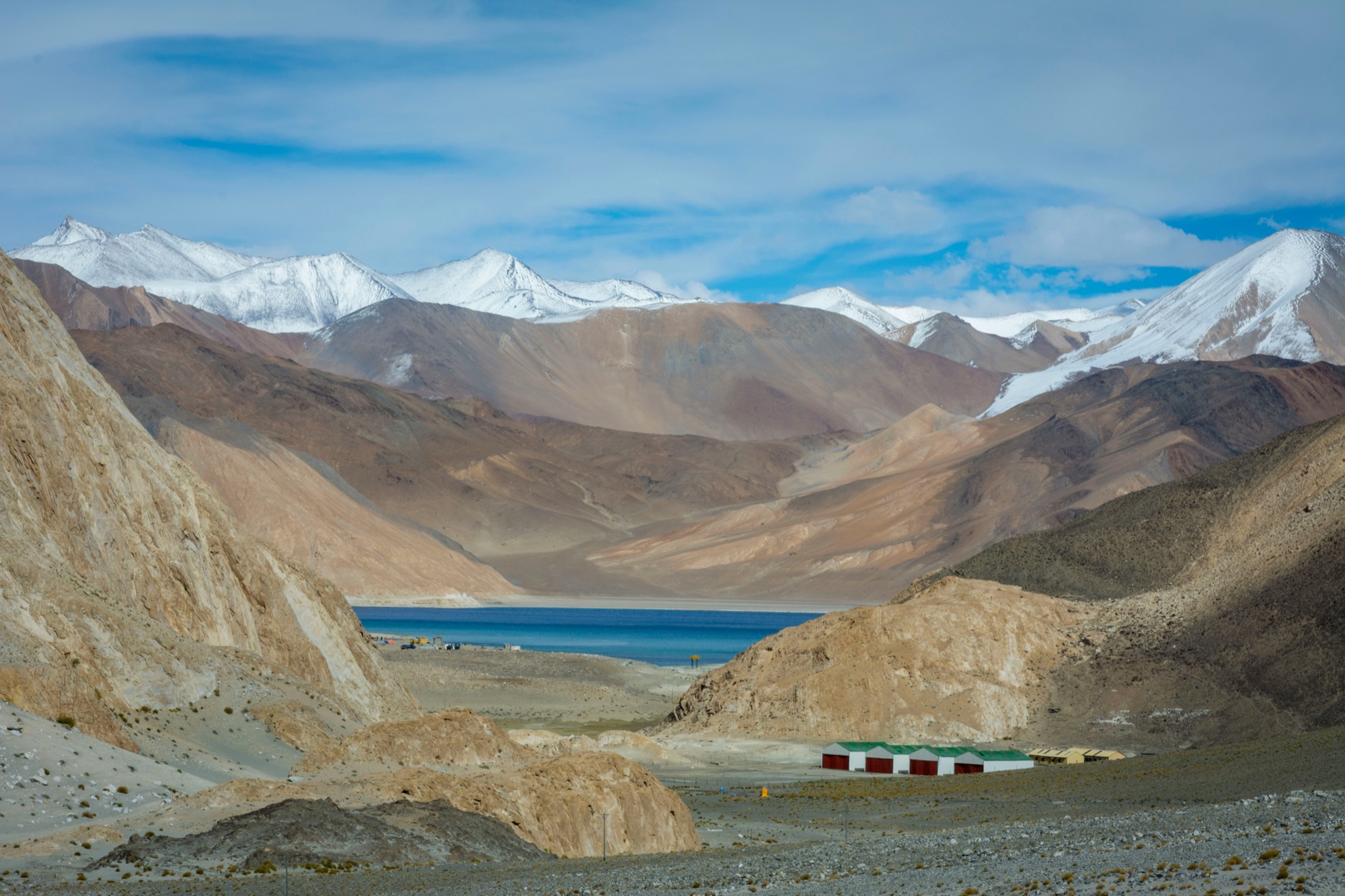 Pangong Lake surrounded by snow-touched mountains